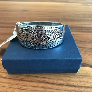 Silver tone bracelet.